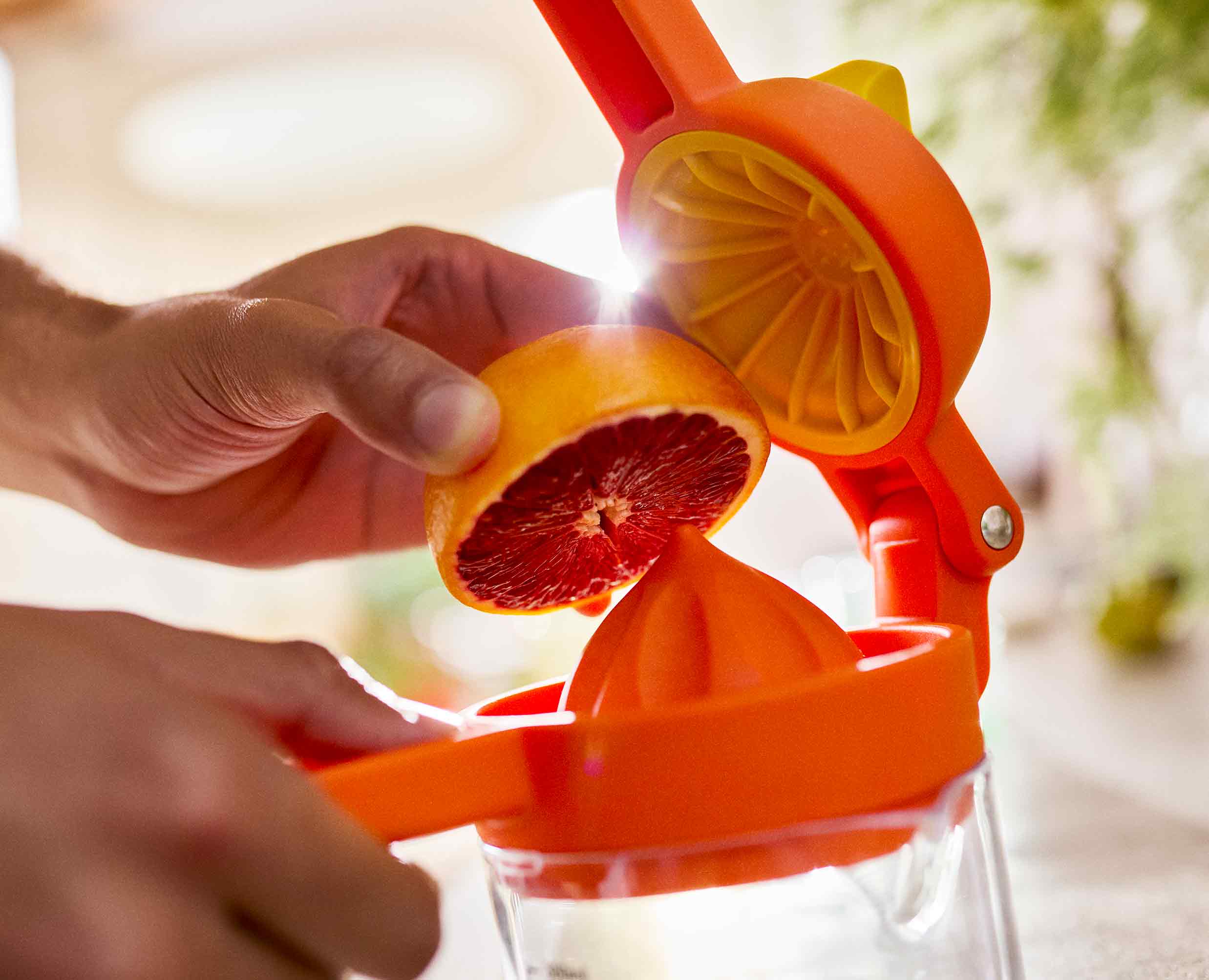 JuiceMax™ Plus Dual-Action Orange Citrus Press with Measuring Cup