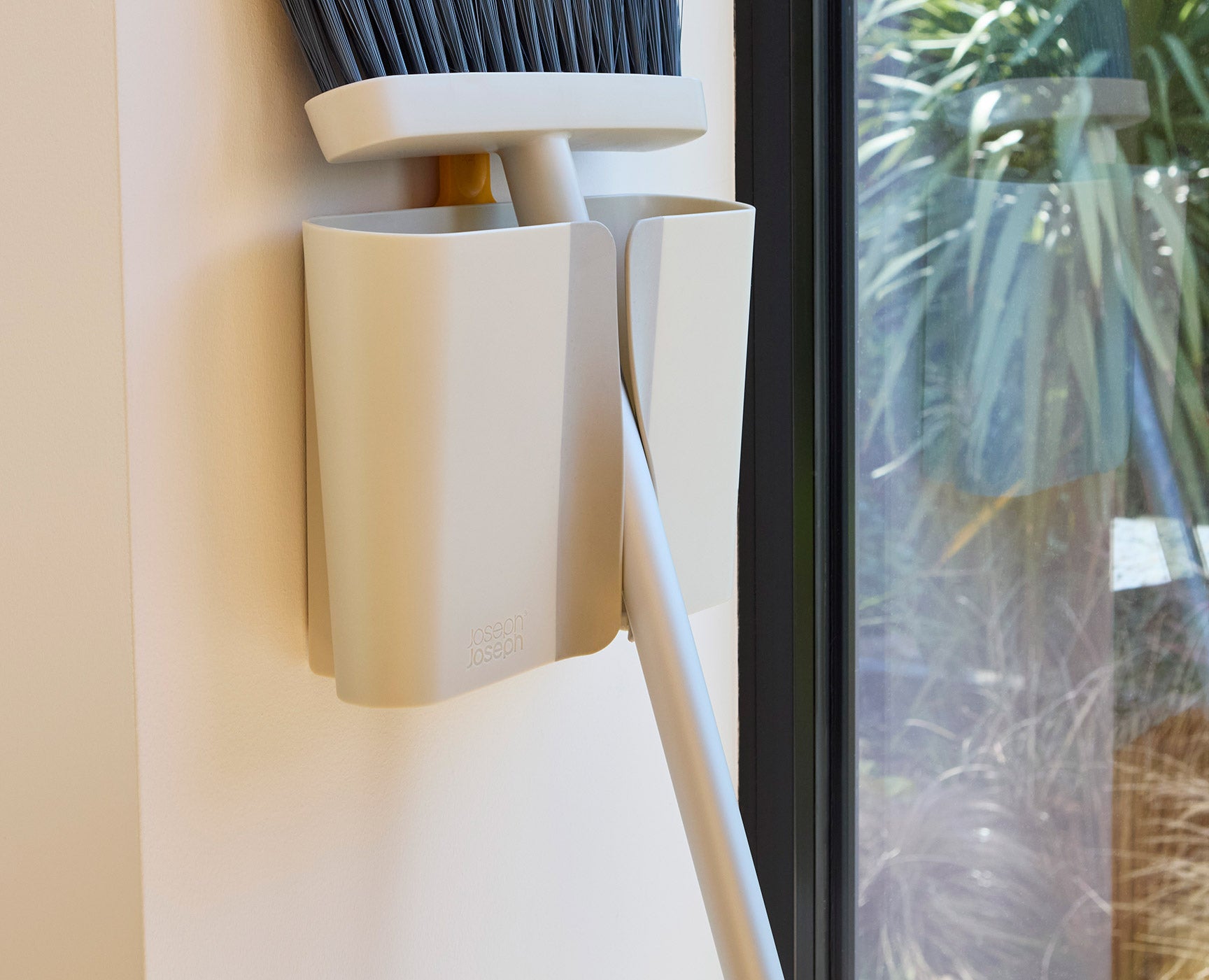 CleanTech Wall-Mounted Broom