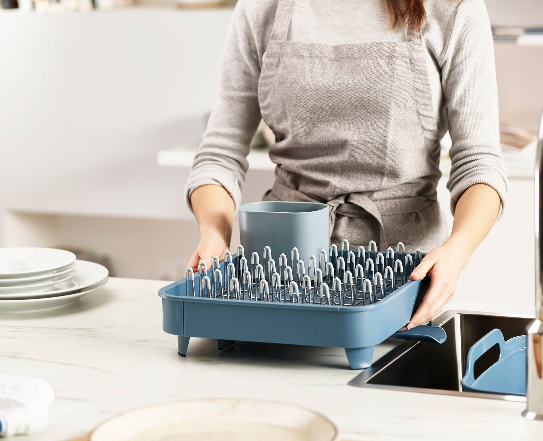 The Extend Dish Drainer compacts to fit your sink needs